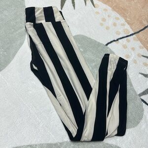 Lularoe Black and white striped beetle juice OS leggings.